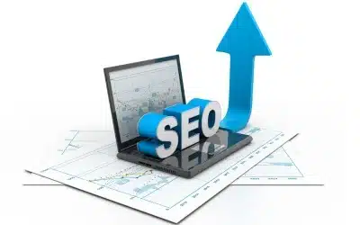 A graphic showing the term "SEO" rising above a laptop and charts